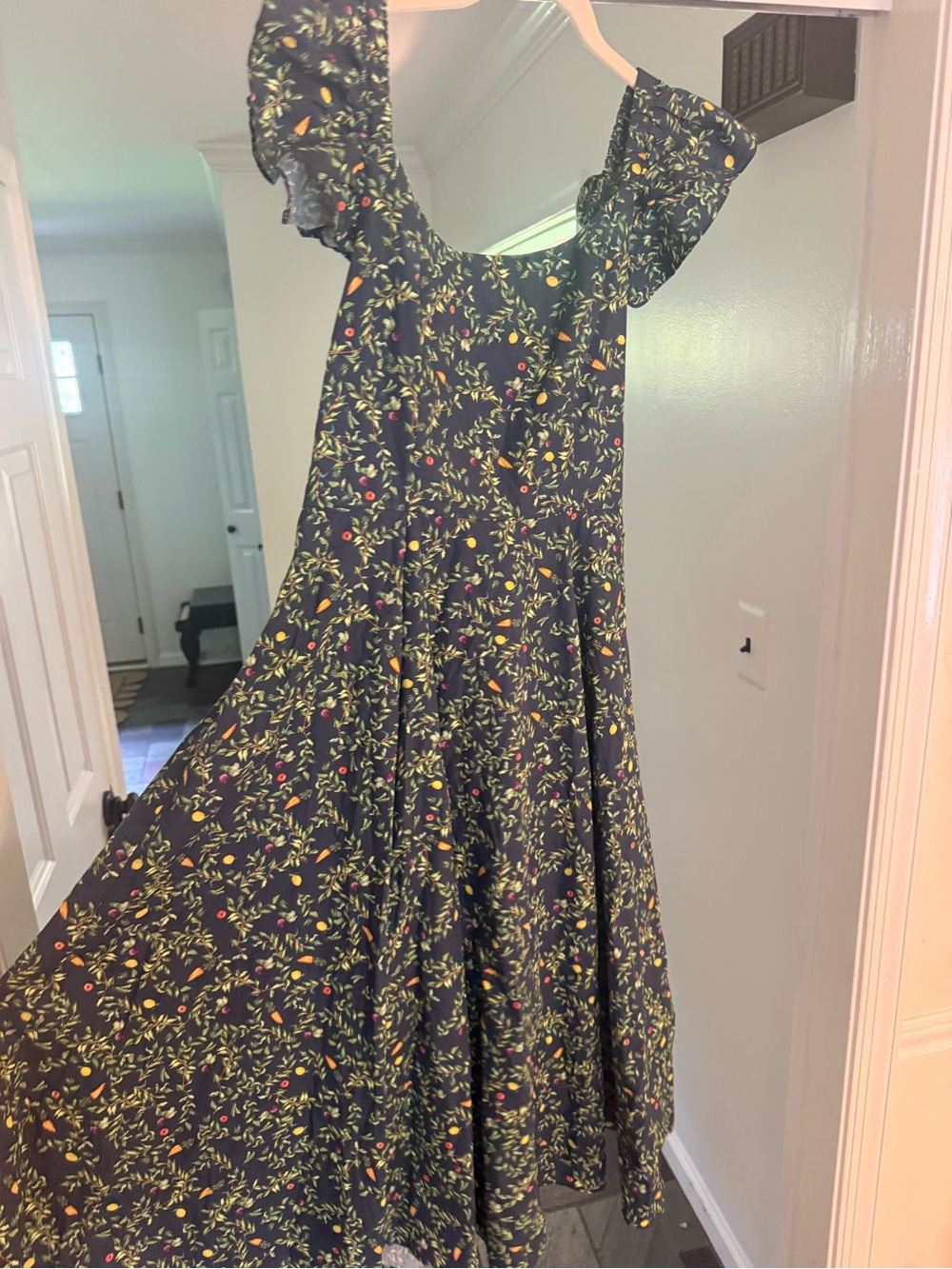 Hill House navy floral midi dress with yellow and red accents